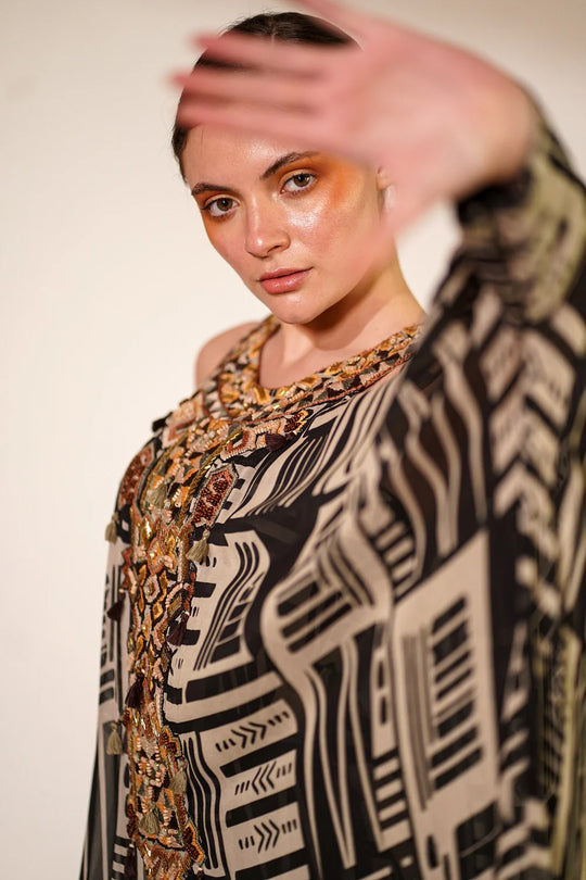 White Base Abstract Print Kaftan With Hand Thread And Wooden Embellishment