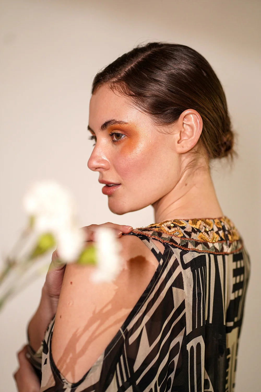 White Base Abstract Print Kaftan With Hand Thread And Wooden Embellishment