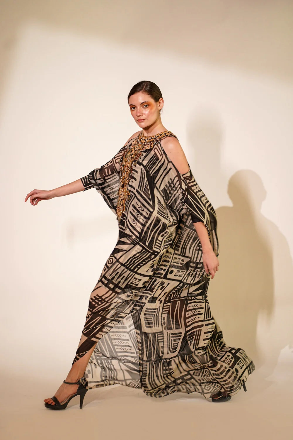 White Base Abstract Print Kaftan With Hand Thread And Wooden Embellishment