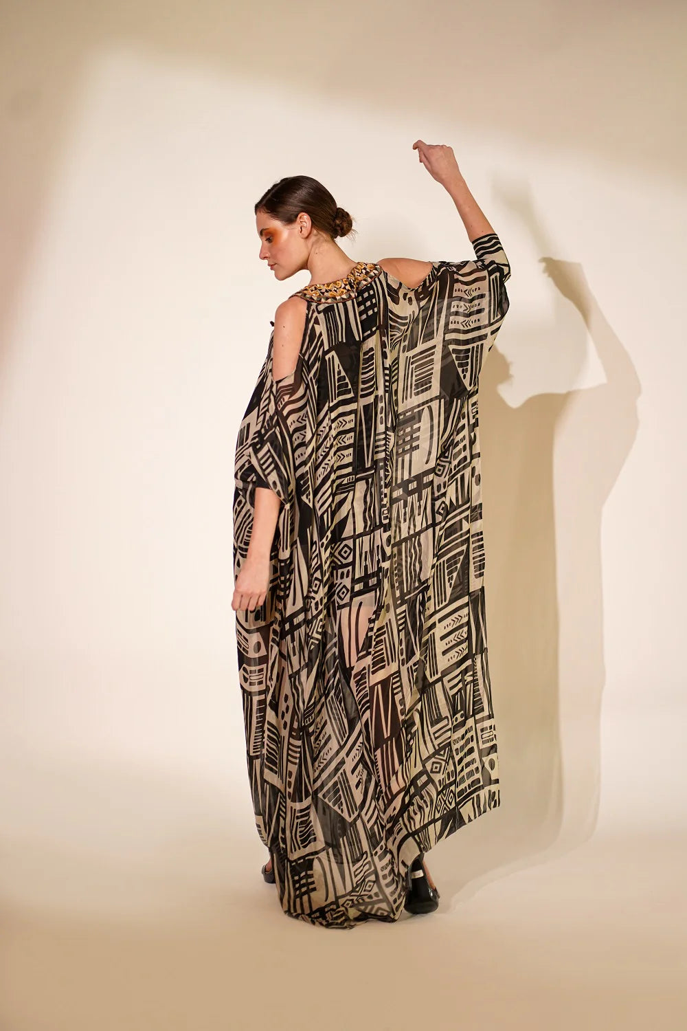 White Base Abstract Print Kaftan With Hand Thread And Wooden Embellishment