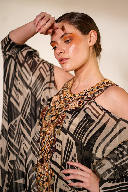 White Base Abstract Print Kaftan With Hand Thread And Wooden Embellishment