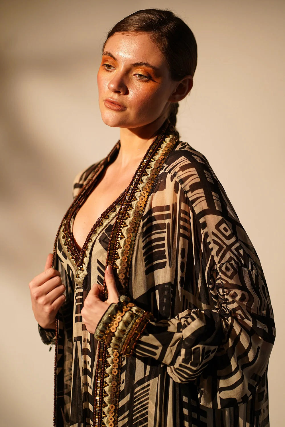 White Base Abstract Print dress With Hand Thread And Wooden Embellishment