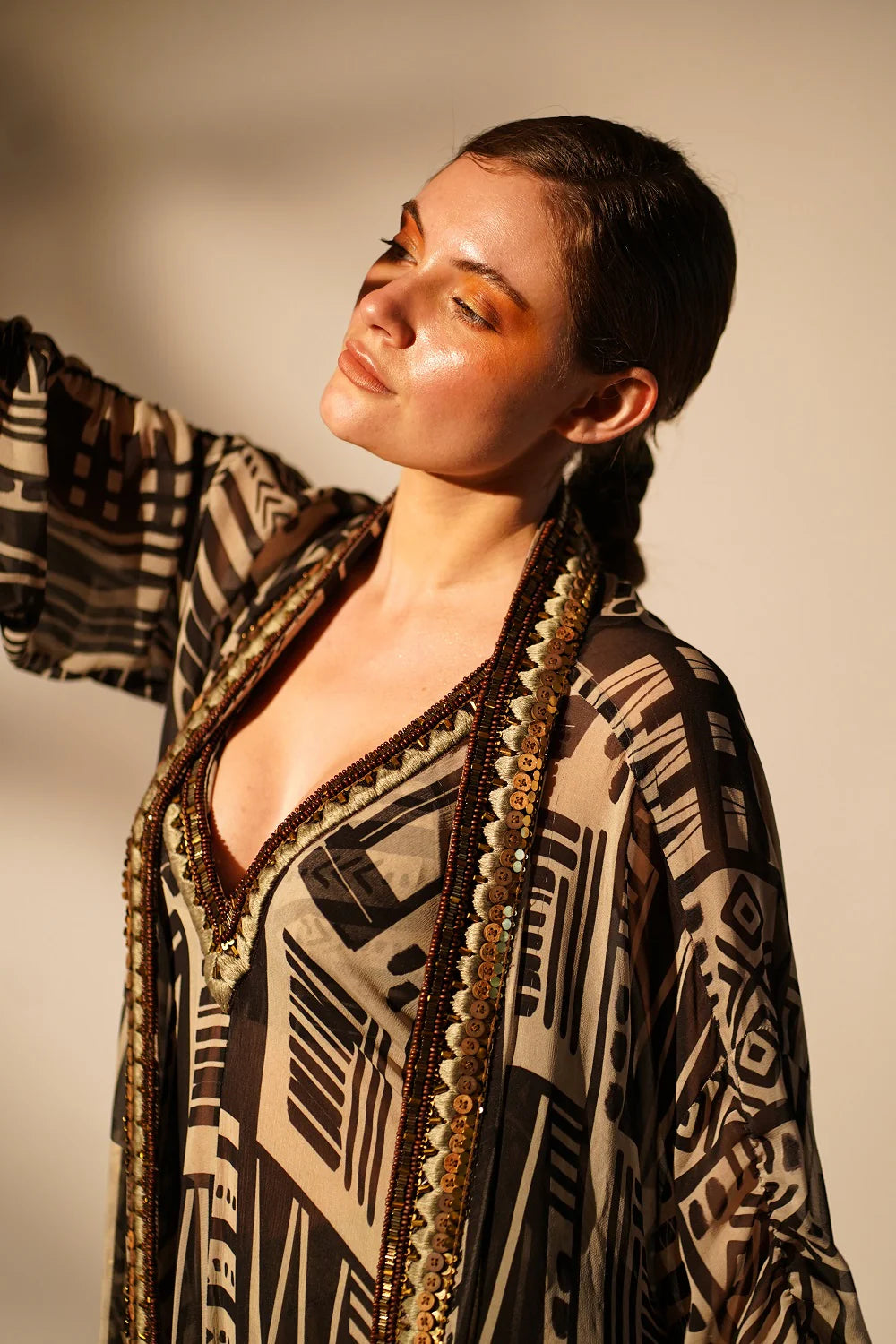 White Base Abstract Print dress With Hand Thread And Wooden Embellishment