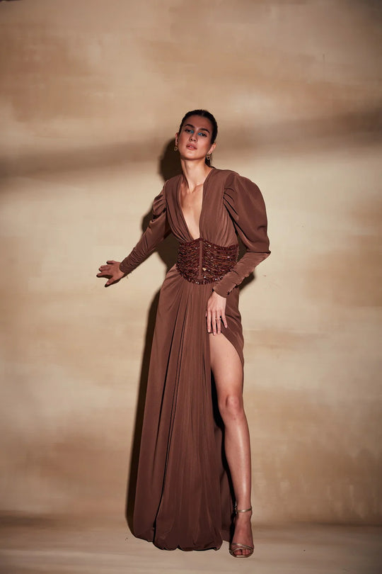 Dark tan maxi dress with thigh slit and soft drape for evening wear